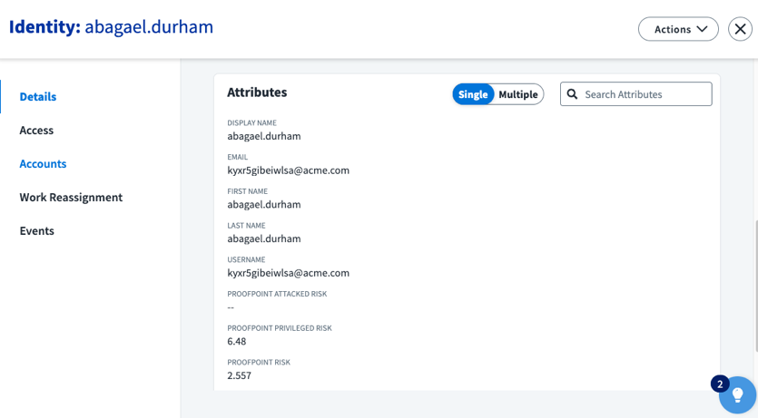 Proofpoint risk score visible as an attribute in the identity