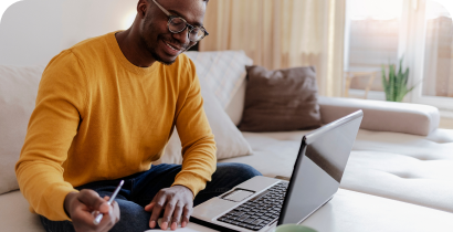 Man working on a laptop at home